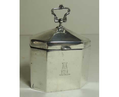 A small late Victorian silver tea caddy of shaped rectangular form having hinged lid with cast scroll handle, the base engrav