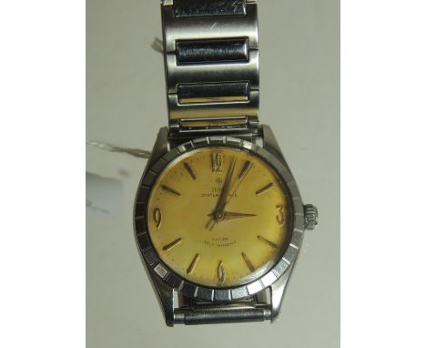 A Tudor Rolex Oyster Prince gents wristwatch having champagne coloured dial with Arabic and baton numerals, centre sweep seco