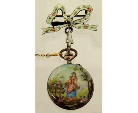 A ladies Swiss silver (.900) gilt and enamelled fob watch, with matching "tied bow" suspension brooch.  The bow light green a