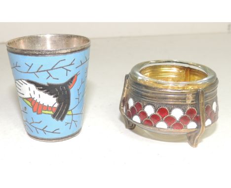 A Russian enamel vodka cup together with a small enamelled salt with clear glass liner (2)