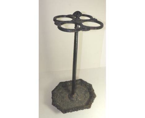 A 19th Century Bullock & Sons painted cast iron four division stick stand on shaped rectangular base, 65cms high