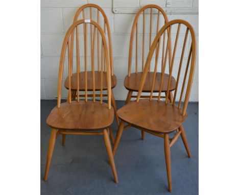 A set of four Ercol Windsor Quaker dining chairs; to include a plank dining table, 152 cm wide, 76 cm deep, 72 cm high.  Desi