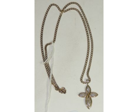 A 9ct gold openwork cross, set with tiny diamonds, on a 9ct gold curb link neck chain. 19" approx.  Total weight 12.3g approx