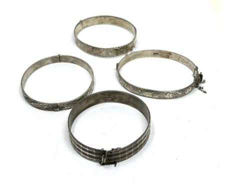 Four Vintage Silver Etched Design Bangles (80g)