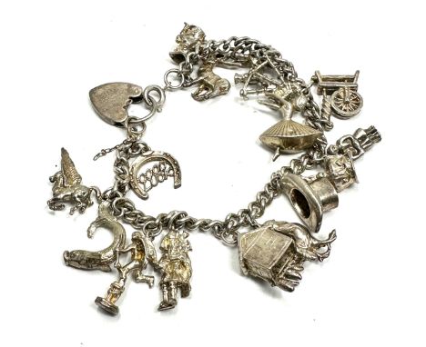Vintage silver G.J Ltd hallmarked bracelet and charms weight 50g
