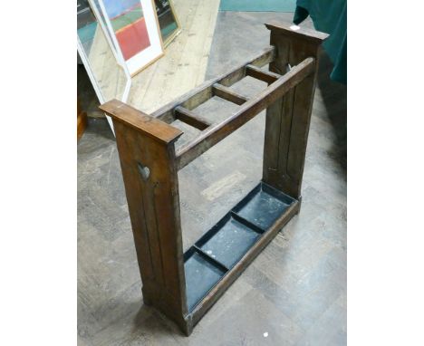 Arts and Crafts oak stick stand with drip tray 