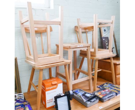 A pair of light beech stick back kitchen chairs and 3 kitchen stools 