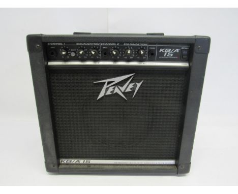 A Peavey KB/A 15 keyboard/acoustic amplifier, with manual 