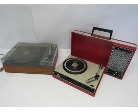 A vintage Philips portable record player in red plastic casing with speaker lid, together with another Philips example 