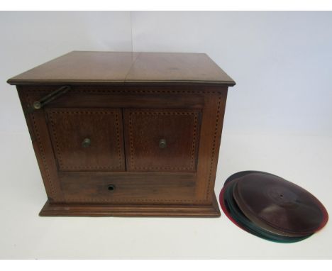 A vintage wind-up gramophone in inlaid mahogany casing, fitted with 'The Diaphone' wooden horn speaker, together with a colle