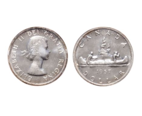 1957.  PCGS graded Proof-Like-67.  Brilliant, with traces of light golden toning.  A Gem.