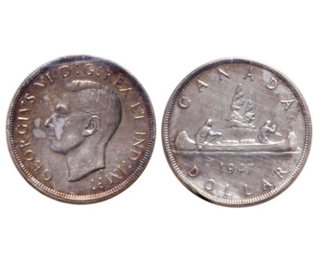1947. Pointed 7. With Dot.  ICCS Mint State-60.  Light to medium heavy golden toning.
