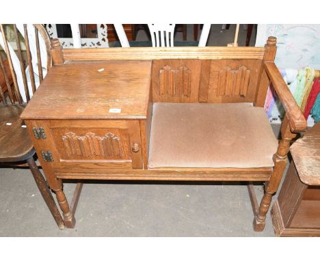 An oak telephone seat