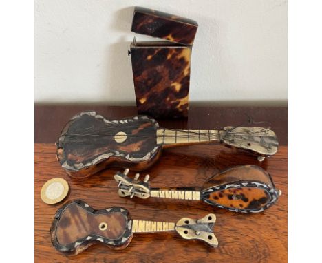 TORTOISE SHELL CARD CASE, MANDOLIN AND TWO GUITARS, LARGE GUITAR APPROX 19cm LONG, ALL AS FOUND
