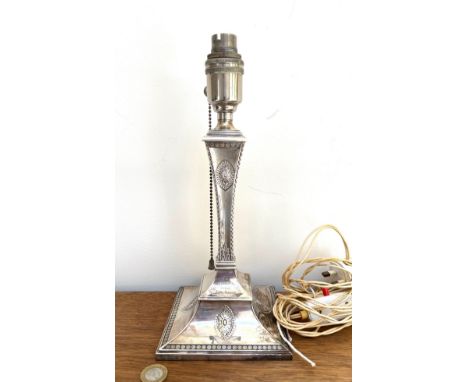 SILVER SINGLE CANDLESTICK CONVERTED TO ELECTRICITY, INSCRIBED. SHEFFIELD ASSAY NOT TESTED FOR WORKING