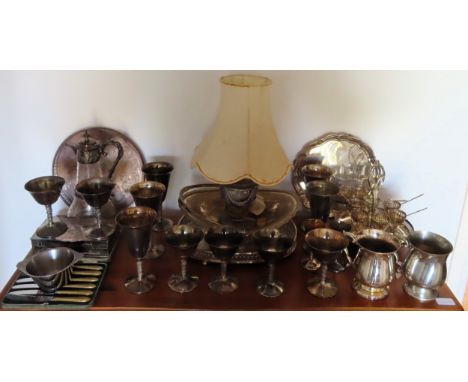 Quantity of silver plated ware, Inc. table lamp, pewter tankards, claret jug, goblets, flatware, etc

all used and unchecked 
