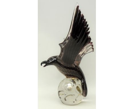 Murano glass model of an eagle in flight, internally decorated with amethyst feathered layers and bubble inclusion, on clear 