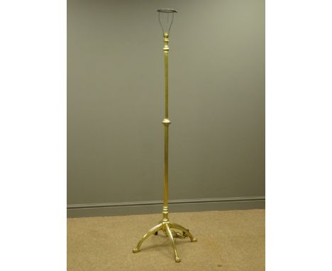 WAS Benson brass lamp stand, single light fitting on telescopic column on four arched strut supports with paw feet, stamped W