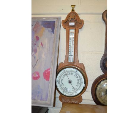 An early 20th Century oak cased barometer