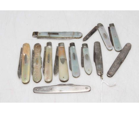 Collection of silver and mother of pearl fruit knives.