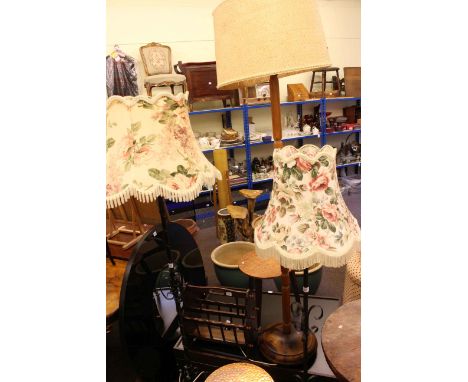 Pair circular copper topped low tables, two wrought metal standard lamps and shades, wooden standard lamp and shade and magaz