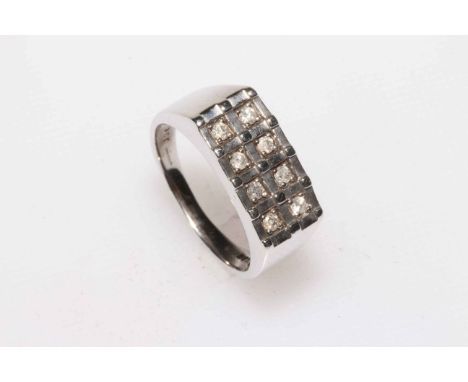 Gents eight stone diamond and 9 carat white gold ring, size R.