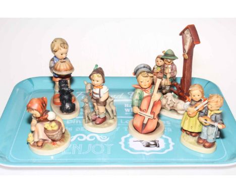 Six Hummel figures including Little Goatherder.