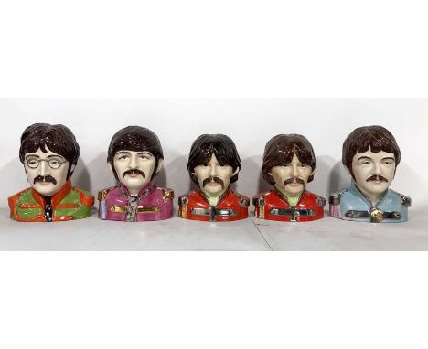 Five painted ceramic figures modelled by Ray Noble. Four in box inc: John (#185), Ringo (#129), George (#183), Paul (#149). A