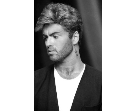 A high-quality photo print depicting George Michael, taken by photographer Martyn Goddard in 1987. The photo depicts George M