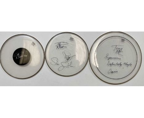 Three Remo drumskins - one signed by Nicko McBrain, one signed by Nicko McBrain, Ian Paice and Steve Smith, one signed by Ton