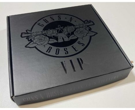 A copy of the limited edition CD and memorabilia boxset Guns N' Roses - Not In This Lifetime with CDs, plectrums, VIP ticket,
