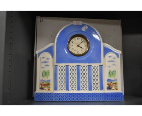 A large continental Art Deco ceramic mantel clock of architectural design in white and blue with landscape panels. 31cm tall 