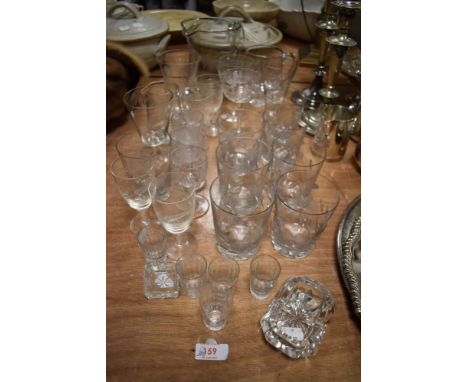 A mixed lot of glass, including vintage etched wine glasses and tumblers.