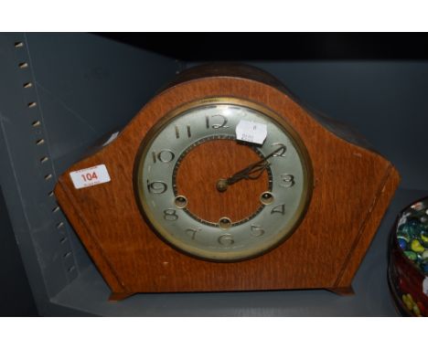An early 20th century oak case mantel clock with Westminster chime.