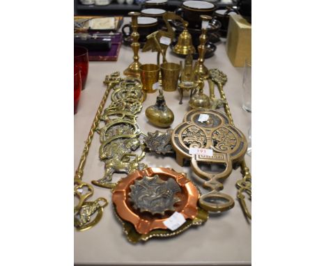 A selection of vintage brass wares including an egg form paper weight.