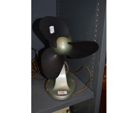 A vintage painted metal 1950s/60s G.E.C desk fan.