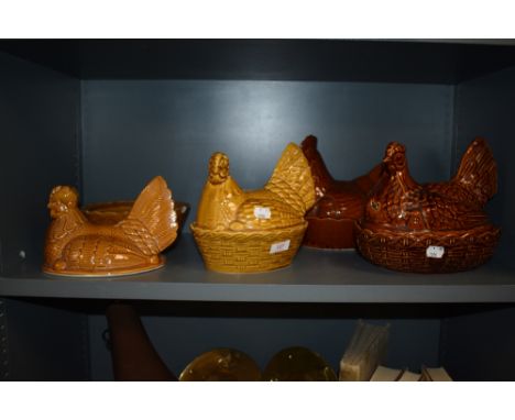 Four vintage ceramic hen and nest form egg baskets including Portmeirion and Walchester AF.