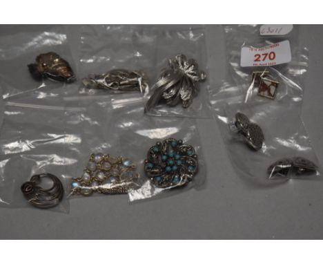 A selection of vintage white metal Celtic or Scottish style jewellery including earrings, brooches and necklace.