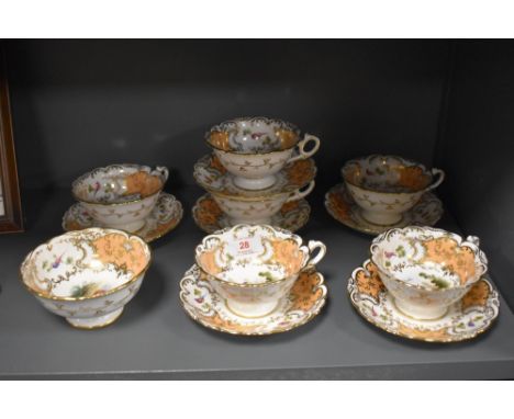 A set of six Coalport hand decorated tea cup and saucers with a sugar bowl. Decorated with birds of paradise.
Each cup and sa