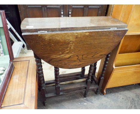 A small Edwardian bobbin tuned gate legged dining table 