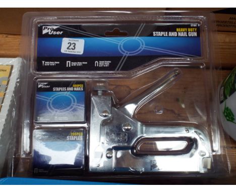 A new heavy duty stapler/nail gun with accessories 