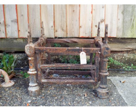 An old cast iron log grate 