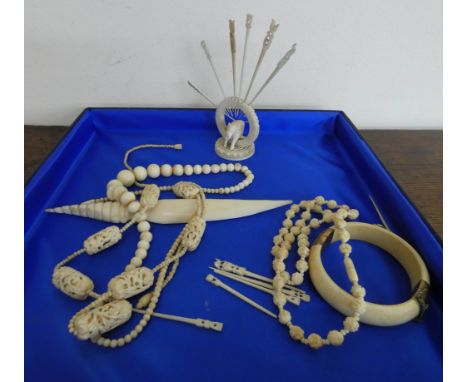 Antique carved ivory bead necklaces, bangle and tooth picks etc 