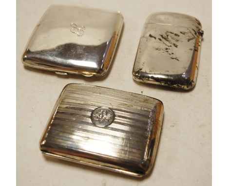 A Victorian silver pocket calling card case, engraved with the initials CH; together with two silver pocket cigarette cases (