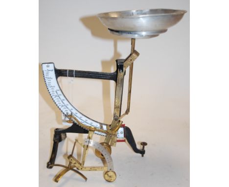 An early 20th century Dutch brass and iron letter scale; together with one other smaller brass example (2) 