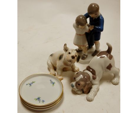 A Lladro figure of a puppy; together with one other Bing & Grondhal figure of a dog; a Bing & Grondhal figure group of childr