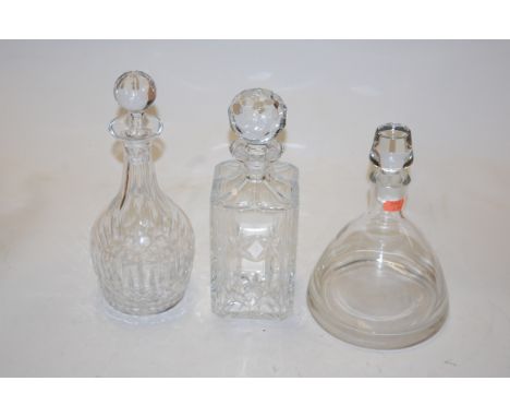A pair of early  20th century cut glass decanters and stoppers together with a ship's decanter and various others (7)