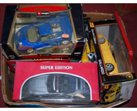 A boxed Bburago 1.18 scale model of a Bugatti together with two other diecast scale models and various Scalextric and track