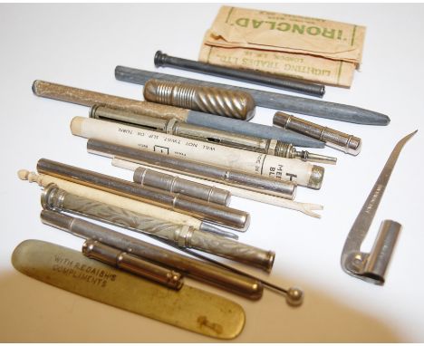 A collection of propelling pencils; steel cased pens; sundry nibs; tools etc 