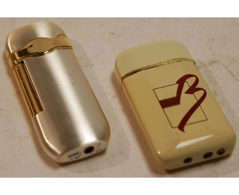 A Ronson pocket cigarette lighter, and one other (2)